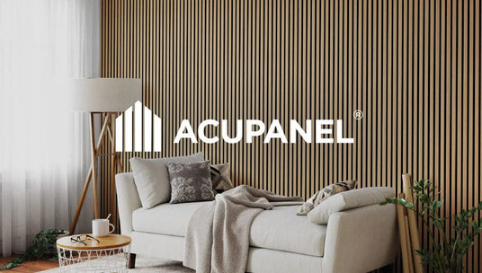 Living room with natural oak wood wall panels and Acupanel logo in the centre