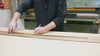 Behind the scenes of a professional wood worker showing how to veneer a piece of wood